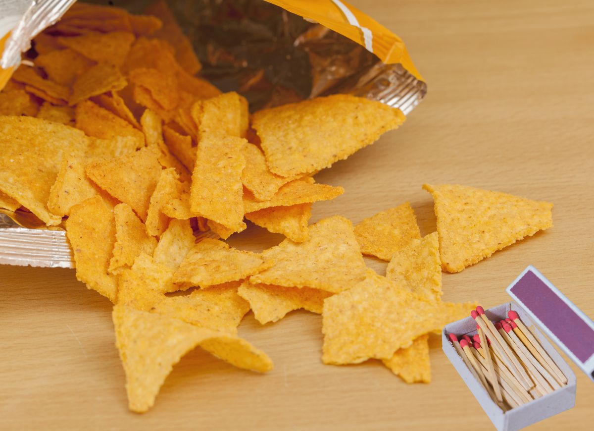 bag of torilla chips and box of matches on the table