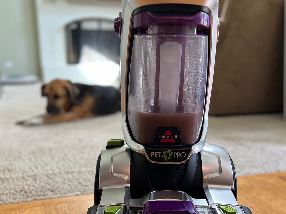 Dirty water tank on Bissell ProHeat 2X Revolution Pet Pro after cleaning family room carpet.