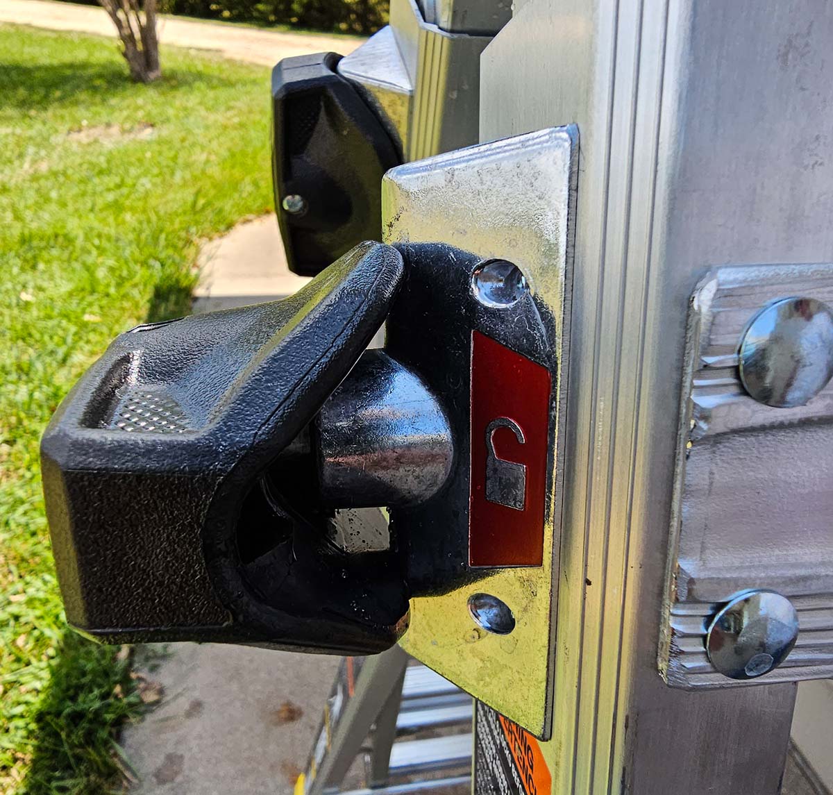 A close-up of the grip locks on the Gorilla ladder