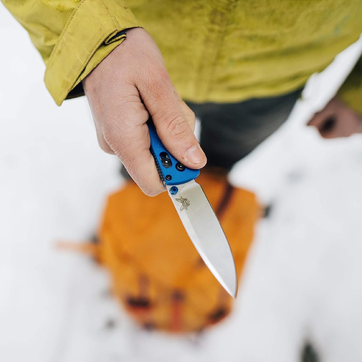 Person holding pocket knife