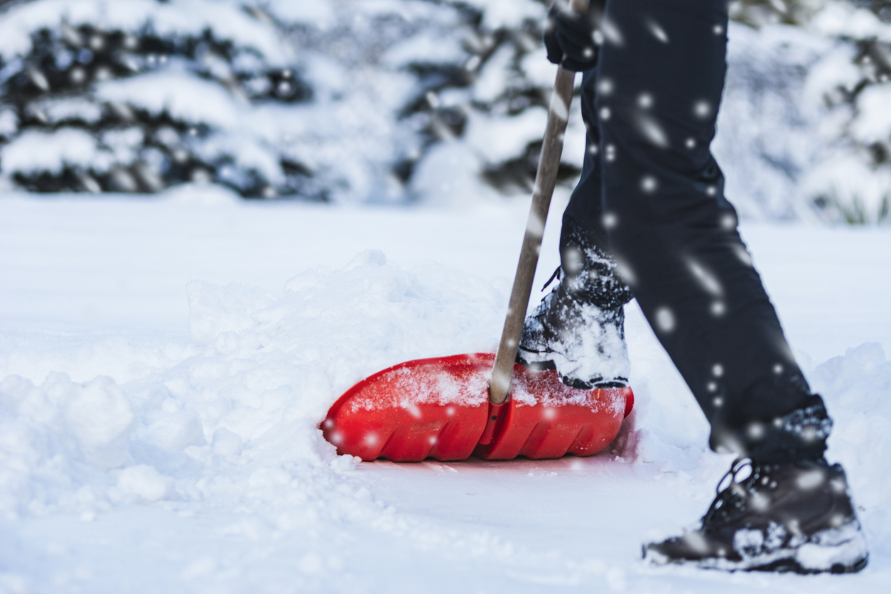 man shoveling snow