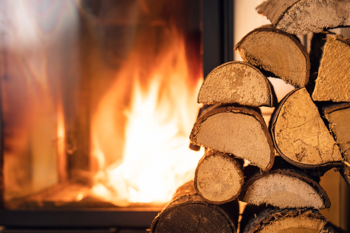 Wood stacked next to chimney