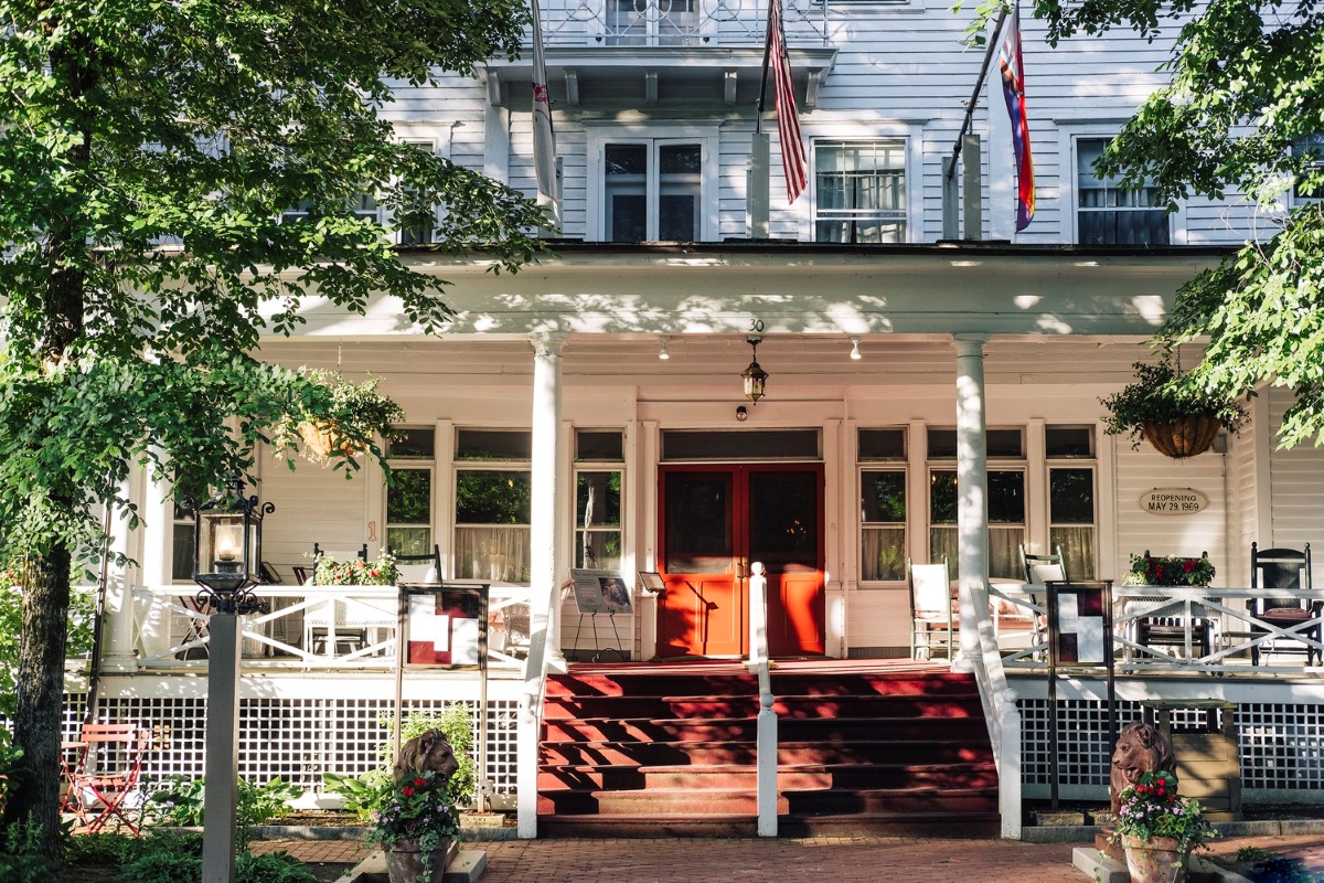 White house with red porch stairs