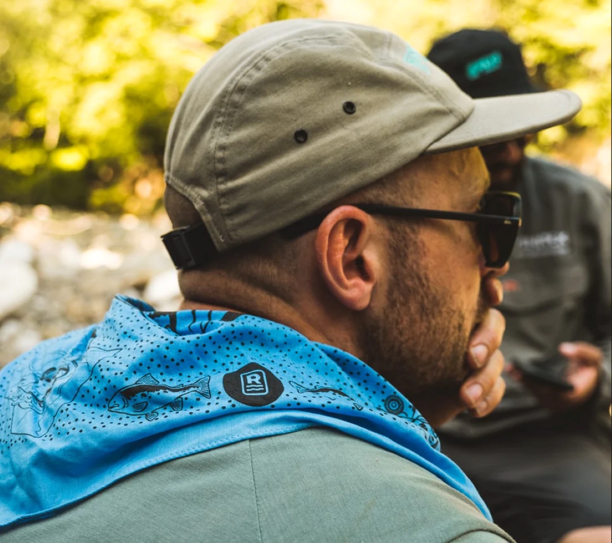 Person wearing blue bandana