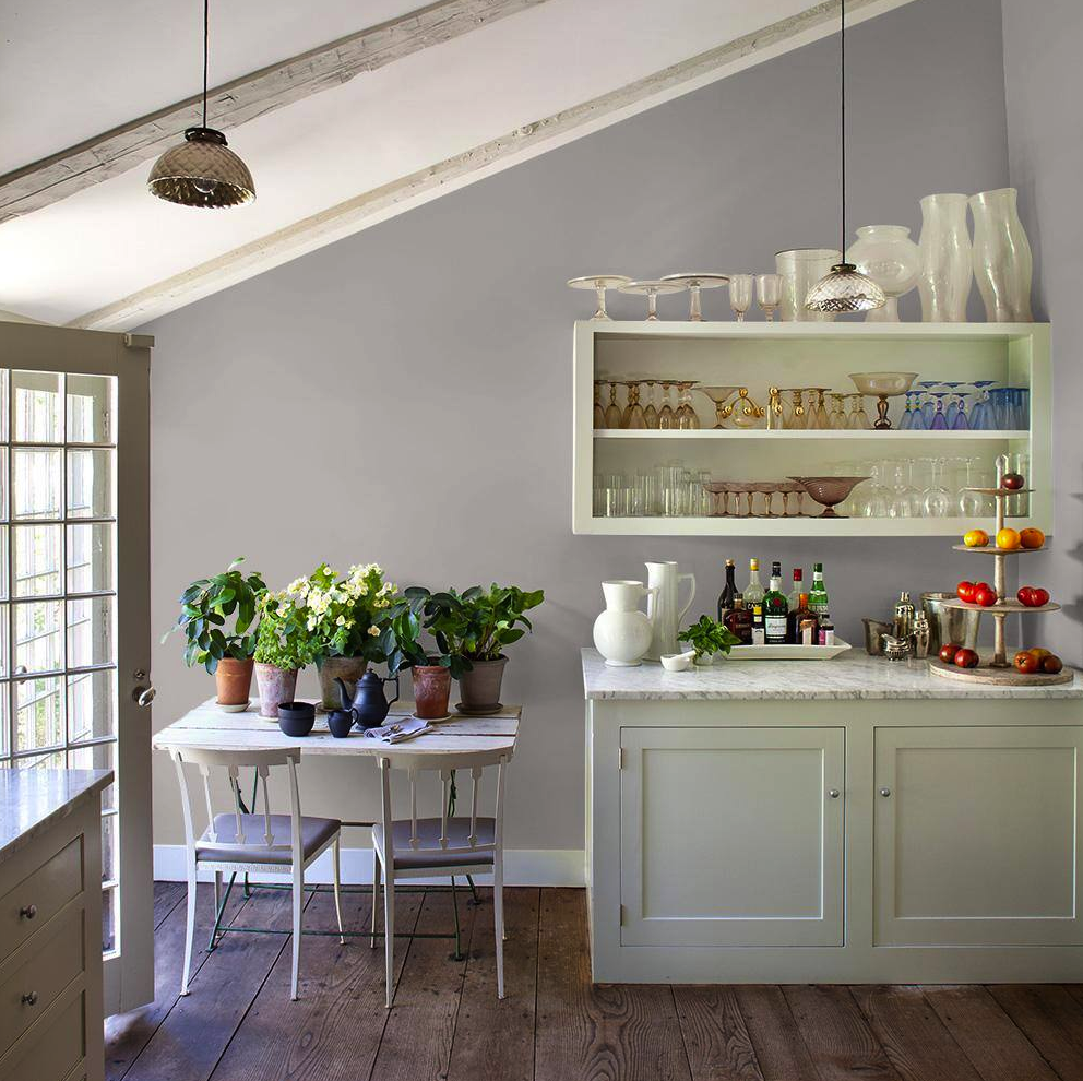 kitchen with slanted ceiling and grey walls