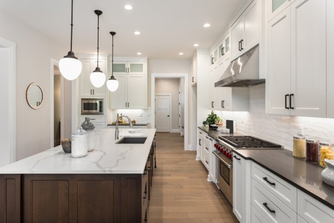 Large luxury kitchen with island.