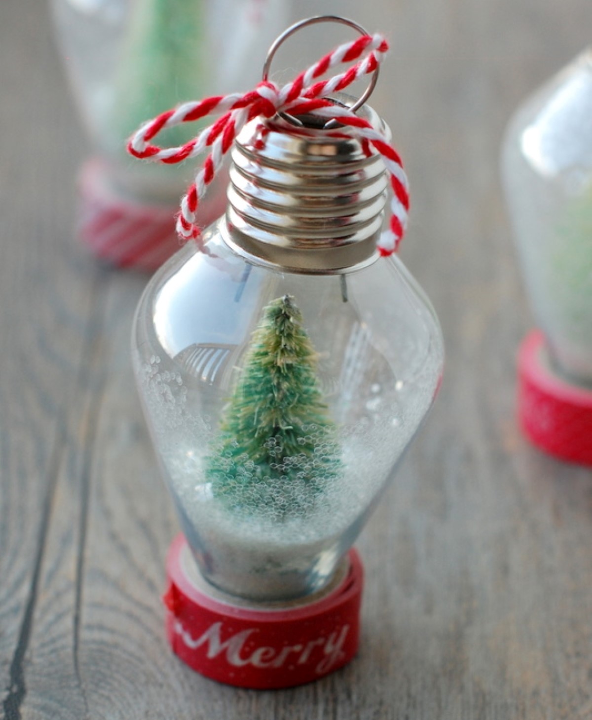 Small light bulb snow globe