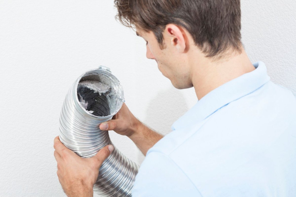 Inspection of an Underground Dryer Vent by a Professional, Exemplifying Who Cleans Dryer Vents in Complex Situations