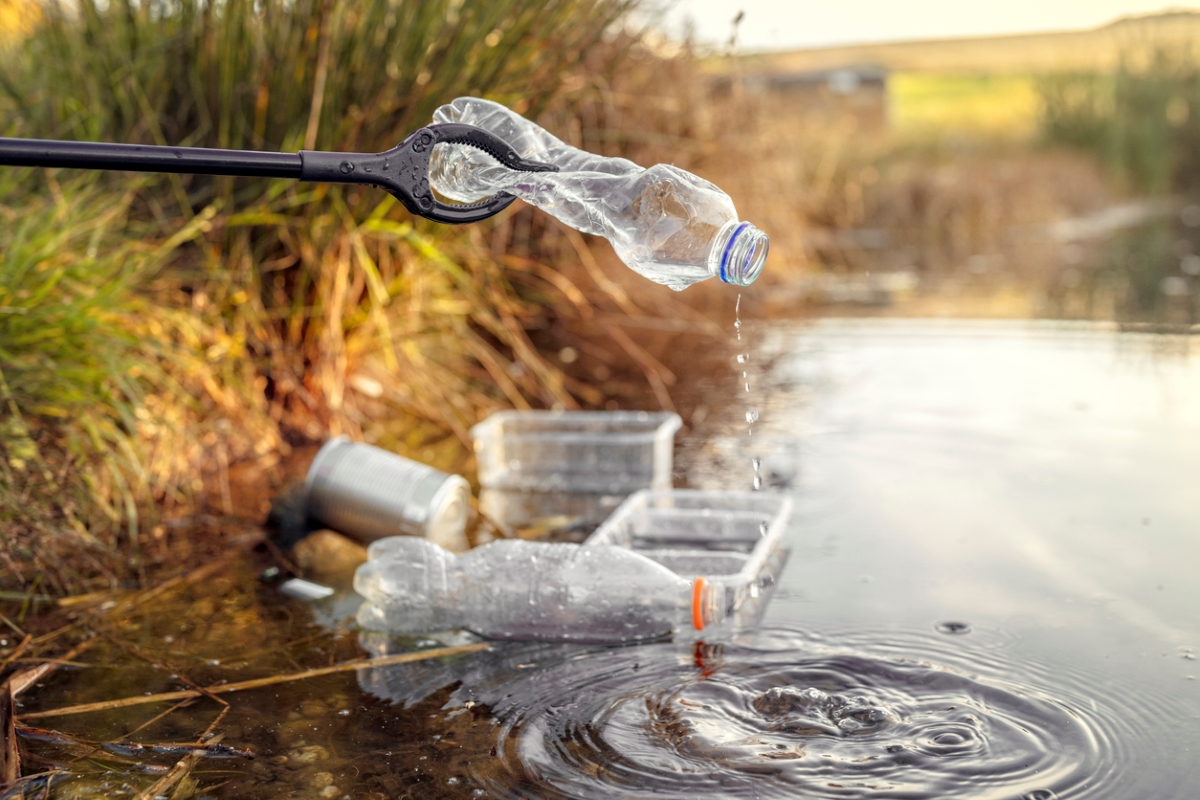 Collecting plastics out of water.