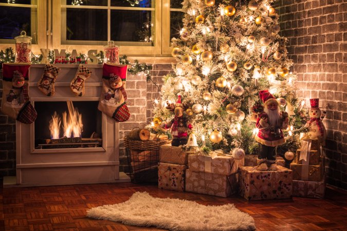 Decorated Christmas Tree Near Fireplace at Home