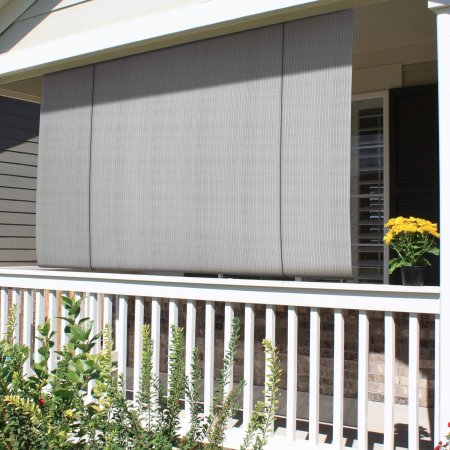  The Patio Paradise Customizable Roll-Up Shades installed at the edge of a front porch above a white railing.