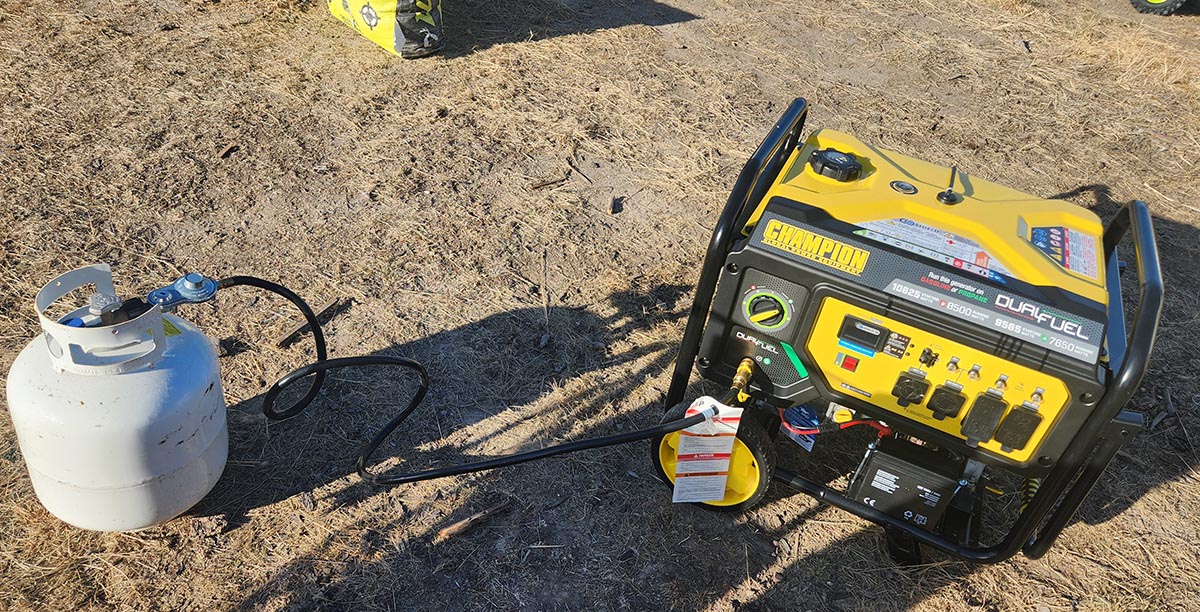 Yellow and black Champion dual-fuel generator running on propane