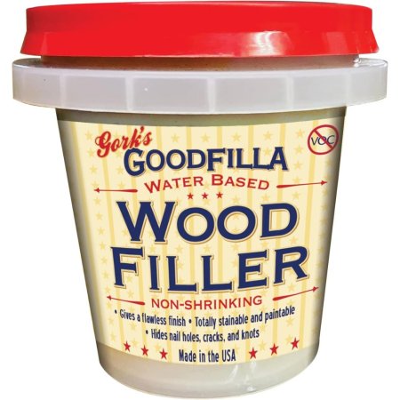  A bucket of Goodfilla Heavy-Body Water-Based Wood & Grain Filler on a white background.