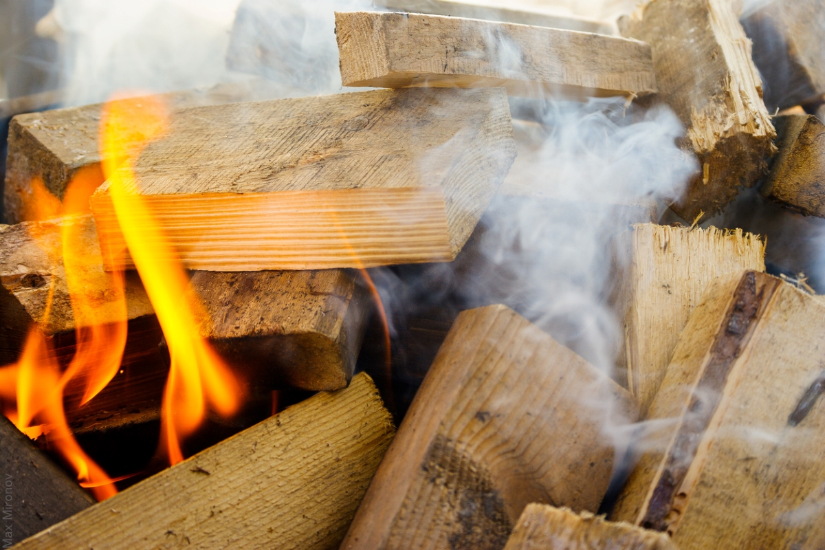 Pieces of treated wood on fire.