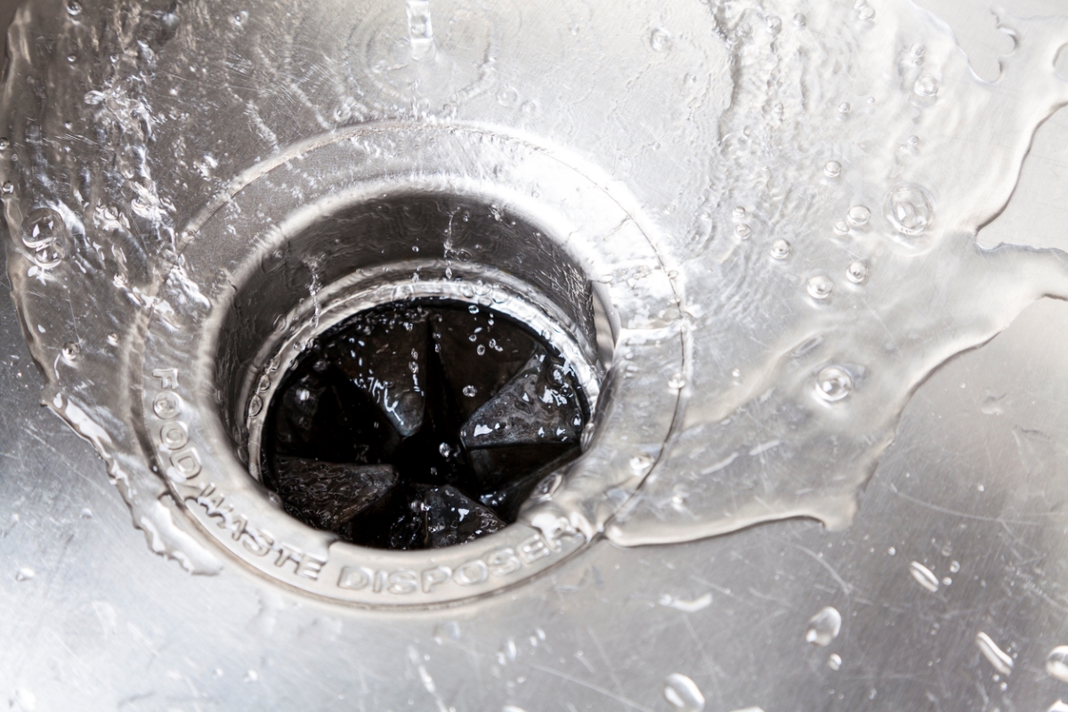 Garbage disposal with water draining.