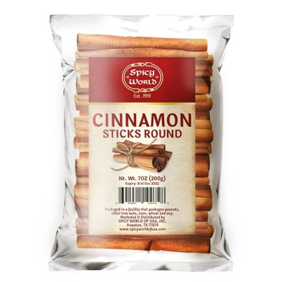 A silver bag of Spicy World Cinnamon Sticks on a white background.