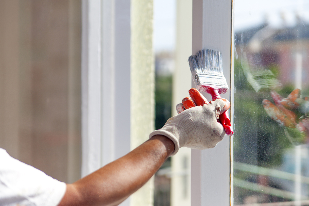 Painting interior window sill white.