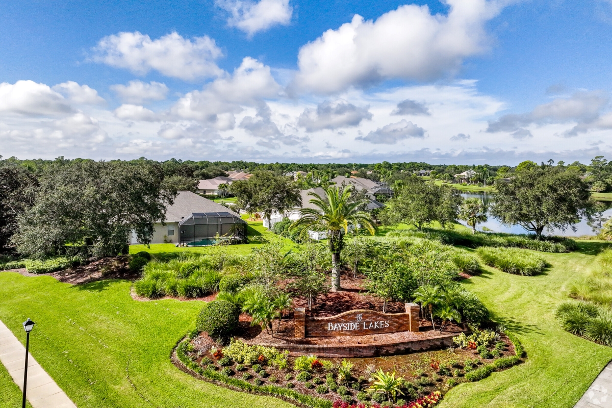 View of Bayside Lakes neighborhood with very green landscape.