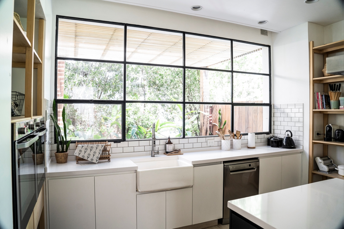 Kitchen grid window without curtains.