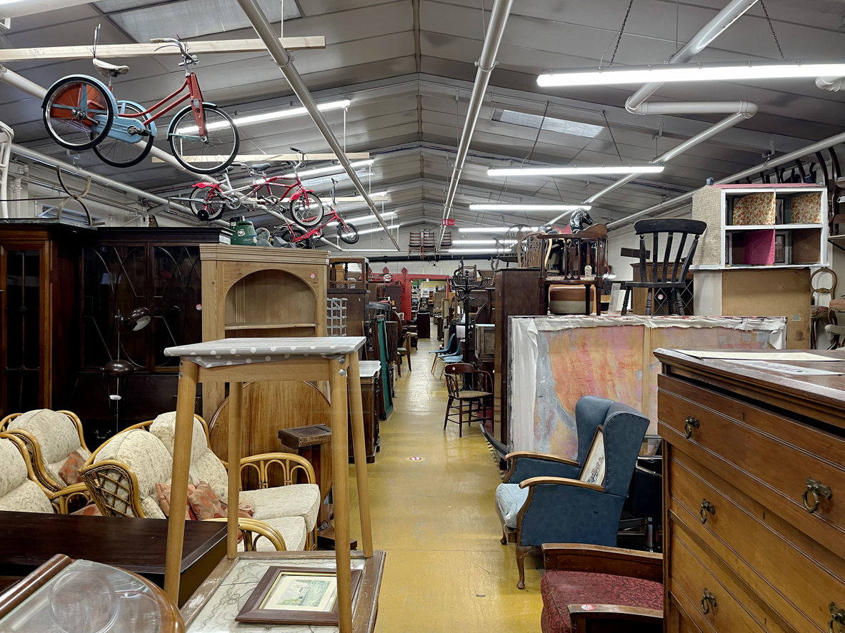 Second hand furniture in a thrift store.