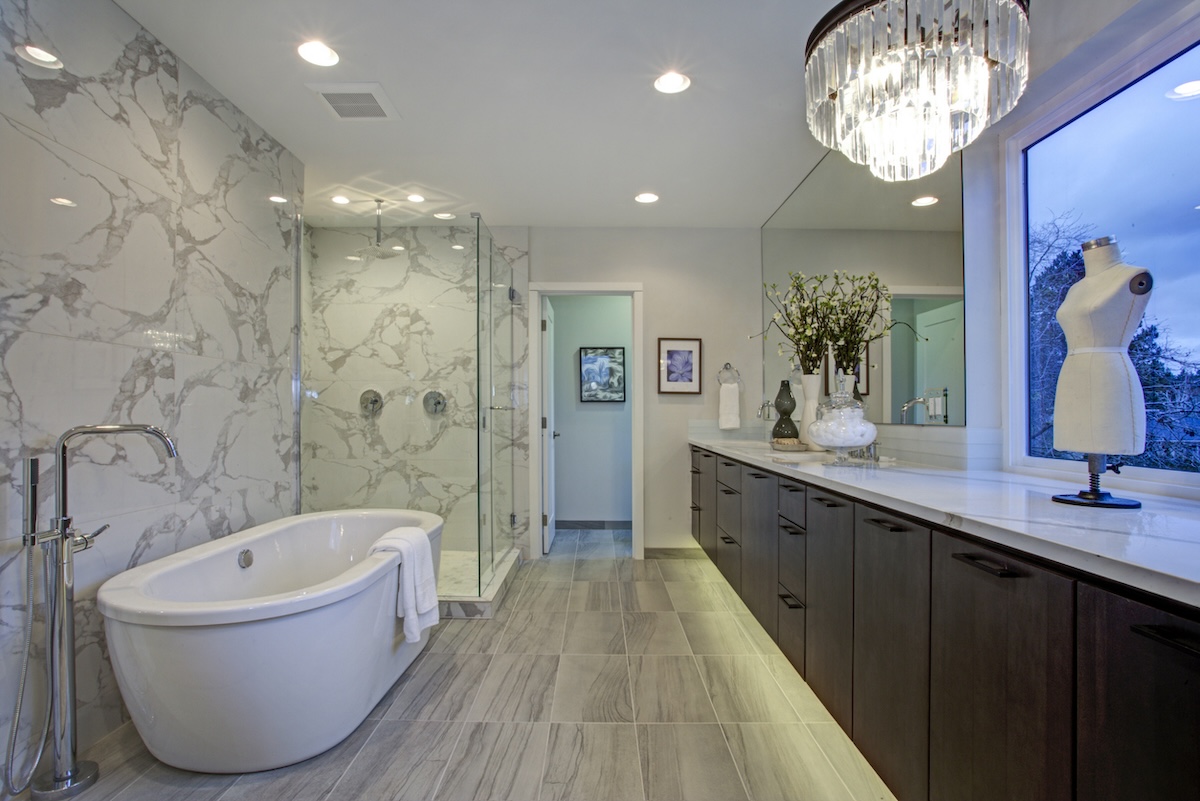 A large primary bathroom off of a primary bedroom.