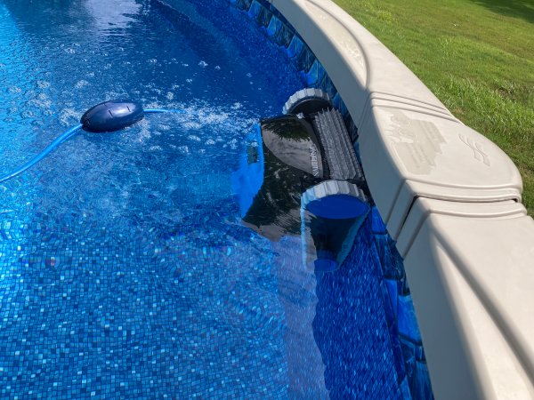 Testing pool vacuums like the Dolphin Nautilus in an above-ground pool