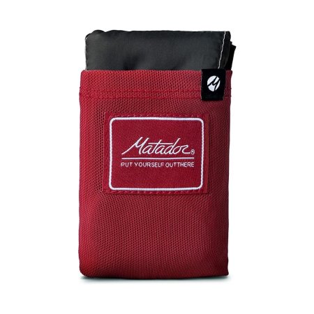  The Matador Pocket Blanket folded and stored in its pocket.