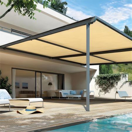  The Shatex Sun Shade Cloth covering lounge chairs next to the edge of a pool.