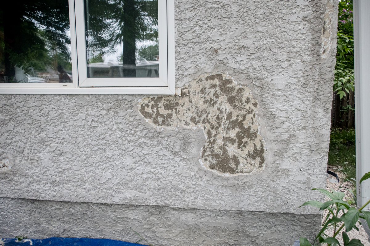 Stucco is getting replaced on the house siding in Winnipeg Manitoba Canada