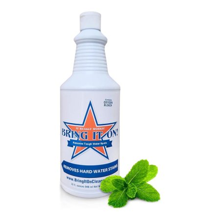  A bottle of RMR Solutions RMR-86 Instant Mold & Mildew Remover and mint leaves on a white background.