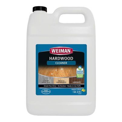 A jug of Weiman Hardwood Floor Cleaner on a white background.