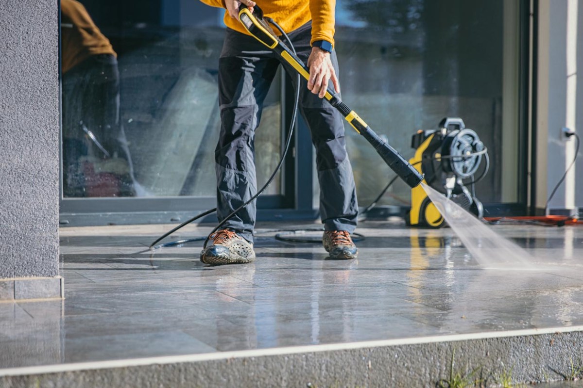 A power washer in use.
