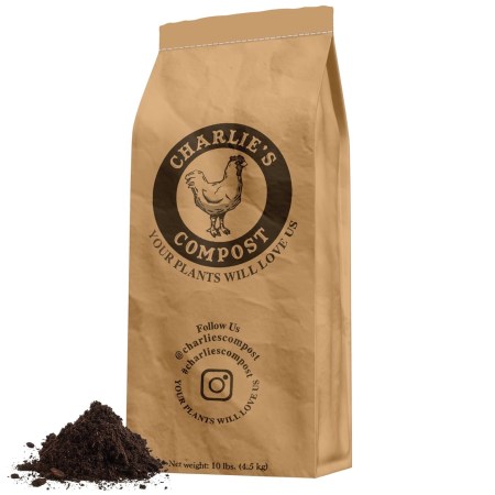  A bag of Charlie's Compost and pile of compost on a white background.