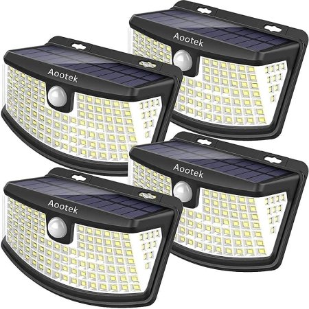  Four of the Aootek New Solar Motion Sensor Lights on a white background.