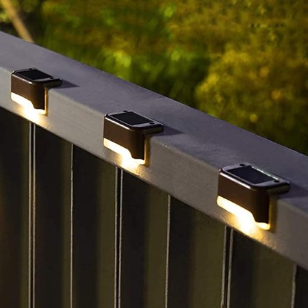  The Solpex Horizontal Warm White Solar Deck Lights Set installed on a deck railng.