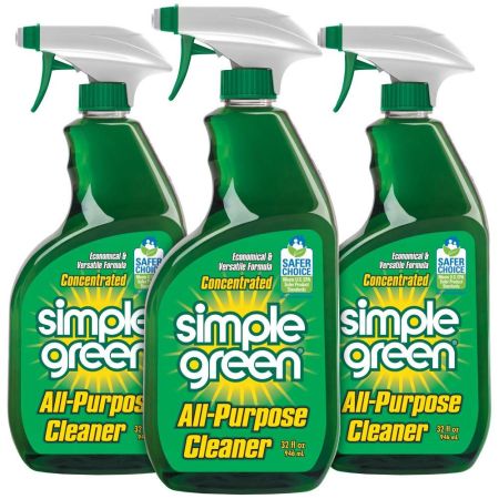  Three spray bottles of Simple Green All-Purpose Cleaner on a white background.
