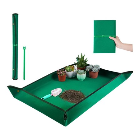  The Onlysuki Extra Large Plant Repotting Mat with supplies and plants on a white background.