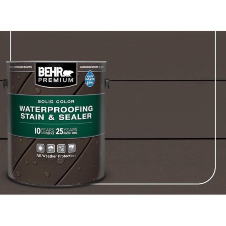  The can of Behr Premium Solid Color Waterproofing Stain & Sealer on a dark background.