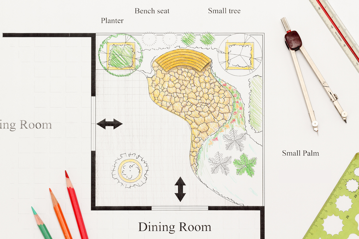 An illustration of a xeriscape landscaping design for a residential home.