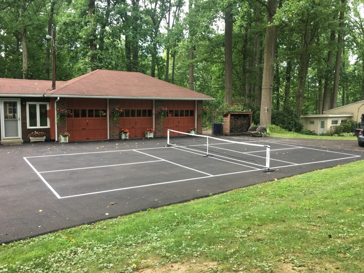 A view of a backyard pickleball court.