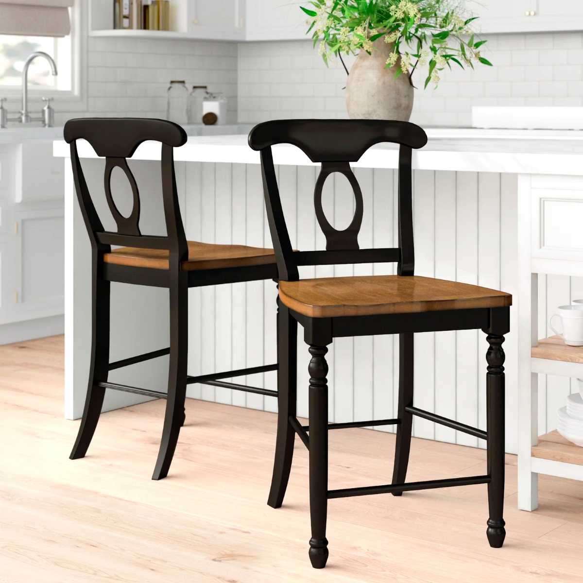 Two black wooden counter stools.