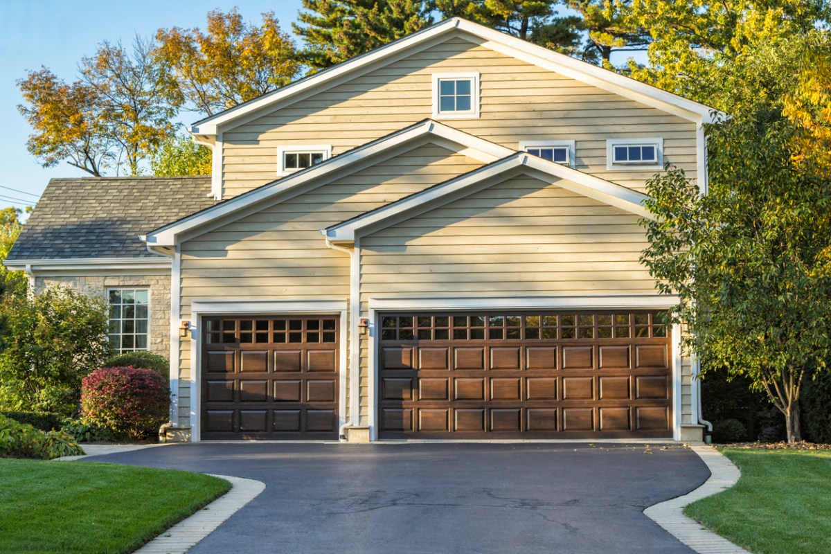 A large garage with wooden doors. 