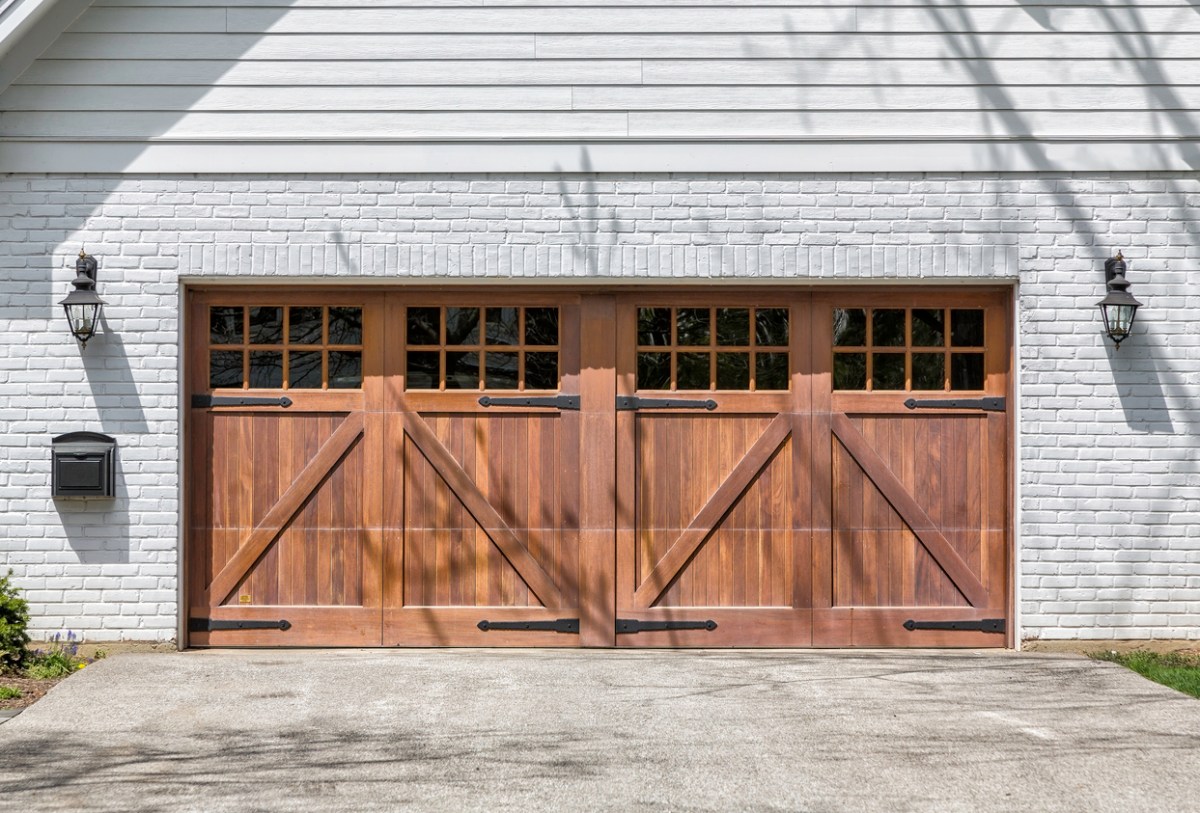 A close up of wooden garage doors. 