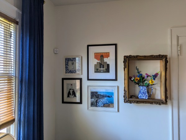 Gallery wall arranged with home editor-approved picture-hanging hacks