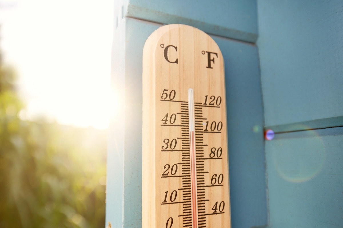 A home thermometer on a hot day during the dog days of summer.