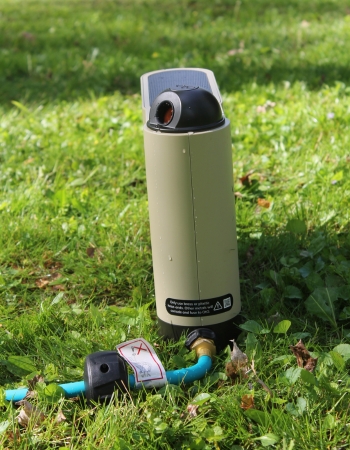 The OtO Lawn Sprinkler set up in a lawn during testing.