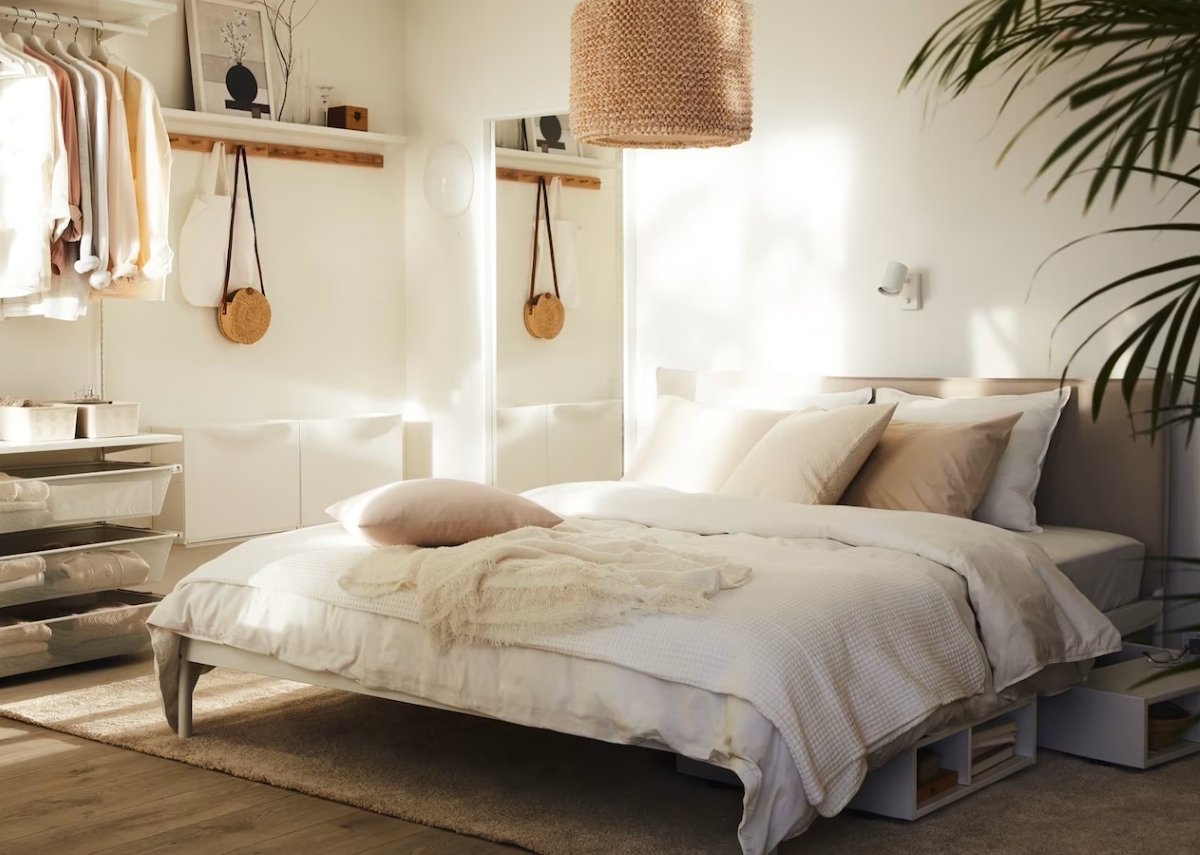 Light colored bedroom with natural light.