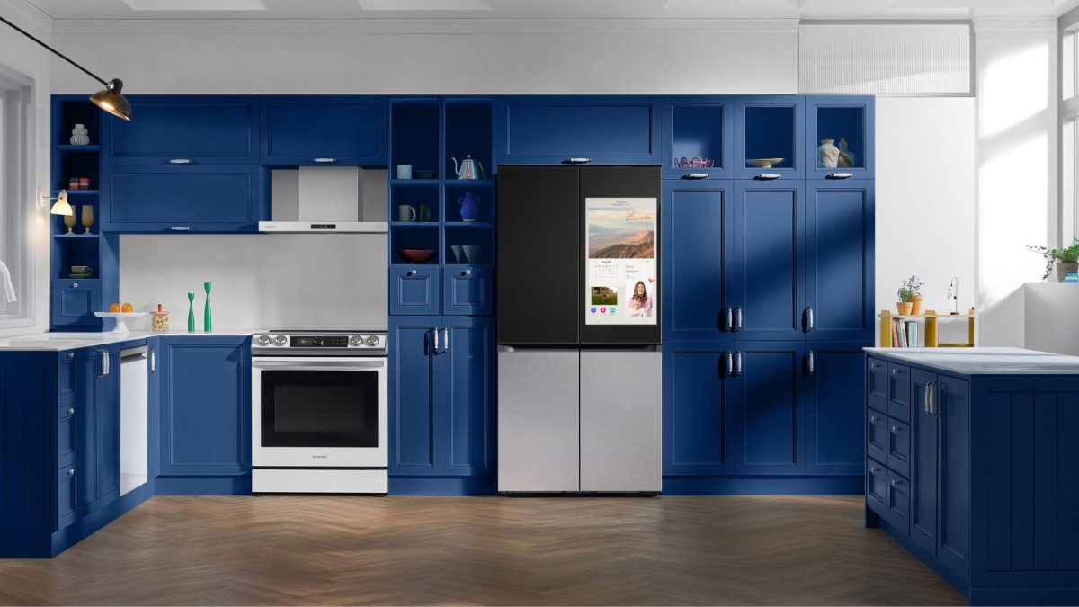 A bright blue kitchen has Samsung appliances and a smart refrigerator with door display.