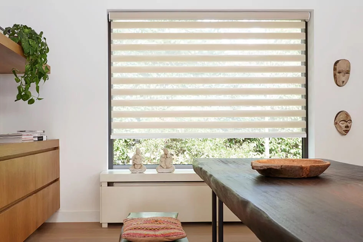Sheer blinds to let natural light in the dining room.