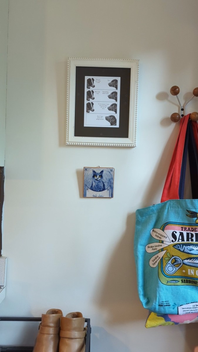 Cat art displayed where paper template used to hang